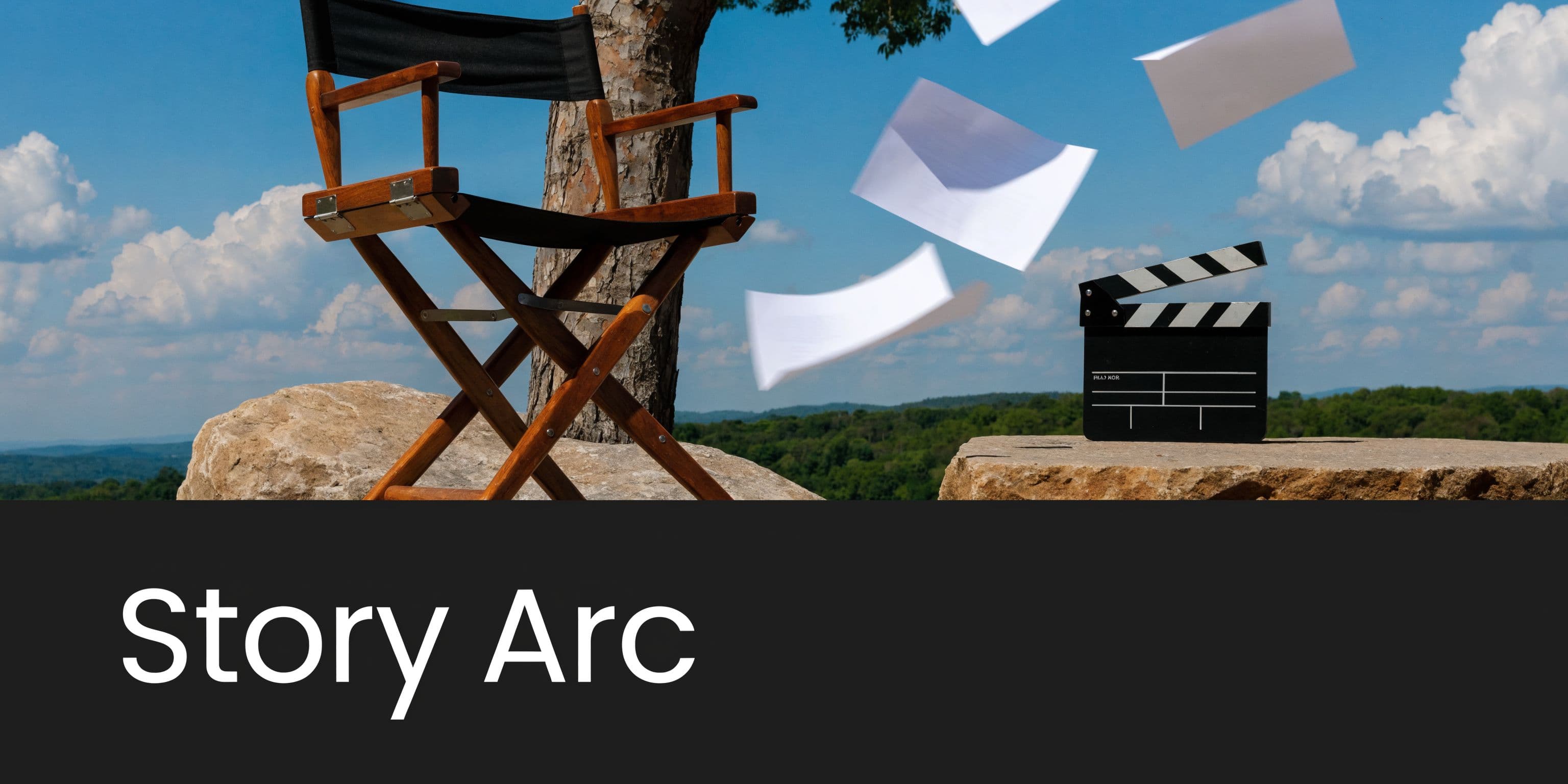 A wooden director chair and a clapperboard on rocks with flying paper pages under a blue sky.